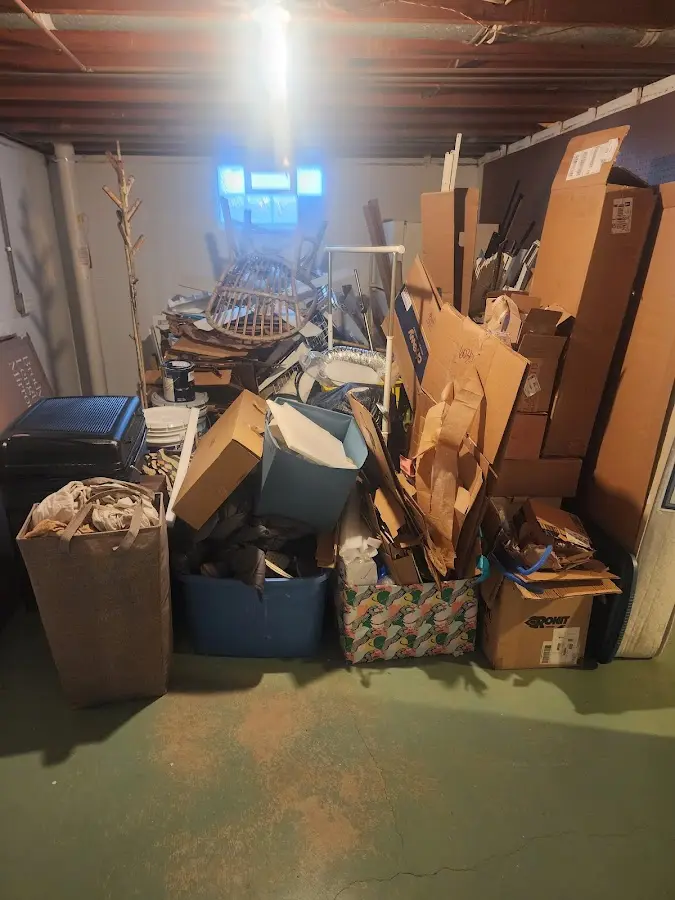 Roll-off dumpster container at job site for 4 Yard Dumpster Rental in Shady Shores